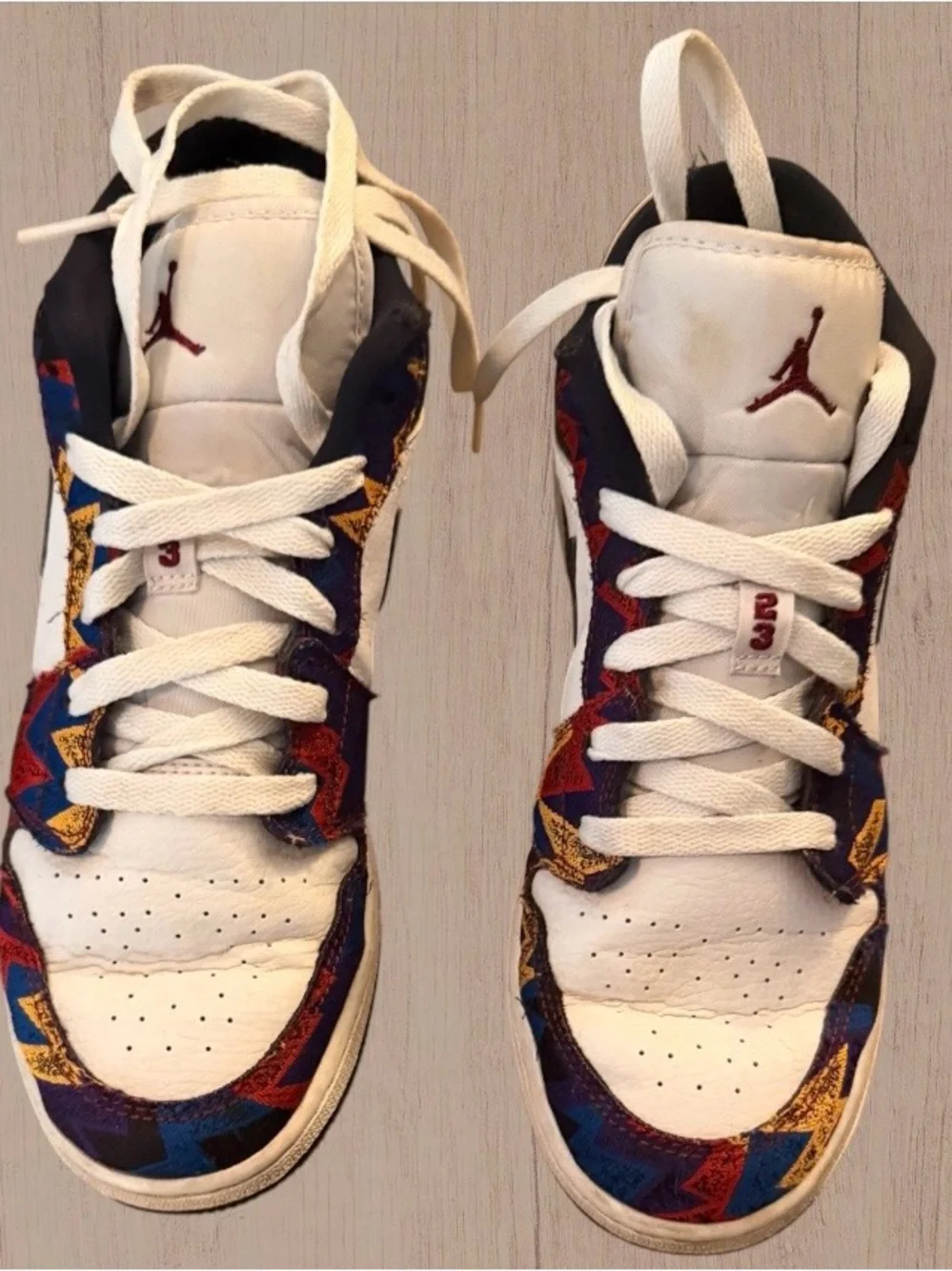 Jordan Low Top Sneakers in White with Black and Multicolor Accents